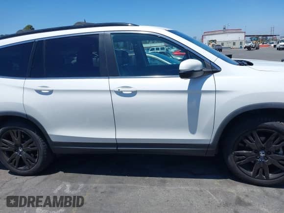 2021 Honda Pilot Special Edition z VIN 5FNYF5H23MB015717, wystawiony jako IAAI lot #42820205 z przebiegiem 48 434 mil mil oraz . Historia ofert i sprzedaży dostępna na DreamBid. Obrazek 13.