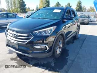 2018 Hyundai Santa Fe 2.4L z VIN 5NMZU3LB1JH098578, wystawiony jako IAAI lot #43506378 z przebiegiem 126 318 mil mil oraz . Historia ofert i sprzedaży dostępna na DreamBid. Obrazek 2.