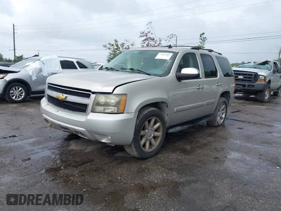 2007 Chevrolet Tahoe LT with VIN 1GNFC130X7R189031, listed as a IAAI auction lot 43403595 with 167,774 mi miles and . Bid and sale history available at DreamBid. Image 17.