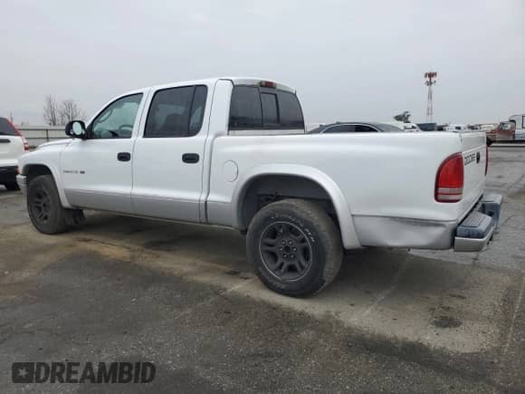 2002 Dodge Dakota SLT with VIN 1B7HL48N22S636413, listed as a Copart auction lot 47884475 with 226,723 mi miles and Clean title. Bid and sale history available at DreamBid. Image 2.