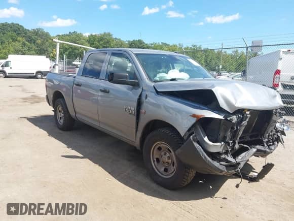 2022 Ram 1500 Tradesman z VIN 3C6RR7KTXNG225257, wystawiony jako IAAI lot #43096669 z przebiegiem 214 514 mil mil oraz . Historia ofert i sprzedaży dostępna na DreamBid. Obrazek 1.