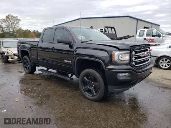 2017 GMC Sierra 1500 SLE z VIN 1GTR1MECXHZ338866, wystawiony jako Copart lot #77050163 z przebiegiem 51 798 mil mil oraz Czysty tytuł • Clean title. Historia ofert i sprzedaży dostępna na DreamBid. Obrazek 4.