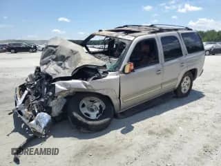 2005 Chevrolet Tahoe LT z VIN 1GNEK13T45J160113, wystawiony jako Copart lot #66521635 z przebiegiem Nie podano mil oraz Szkoda całkowita • Salvage title. Historia ofert i sprzedaży dostępna na DreamBid. Obrazek 1.