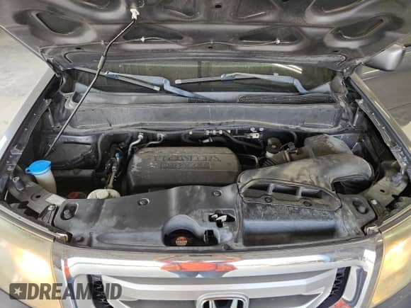 2011 Honda Pilot EX-L z VIN 5FNYF4H7XBB084519, wystawiony jako Copart lot #68644595 z przebiegiem 186 578 mil mil oraz Szkoda całkowita • Salvage title. Historia ofert i sprzedaży dostępna na DreamBid. Obrazek 12.