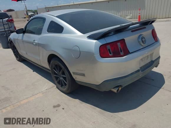 2012 Ford Mustang Premium with VIN 1ZVBP8AM3C5208320, listed as a IAAI auction lot 42941201 with 99,612 mi miles and . Bid and sale history available at DreamBid. Image 3.