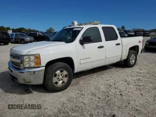 2013 Chevrolet Silverado 1500 LT with VIN 3GCPKSE71DG240282, listed as a Copart auction lot 83777815 with 184,756 mi miles and Clean title. Bid and sale history available at DreamBid. Image 1.