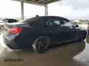 2018 BMW 7 Series 750i with VIN WBA7F0C56JGM22820, listed as a Copart auction lot 84008985 with 82,715 mi miles and Salvage title. Bid and sale history available at DreamBid. Image 3.