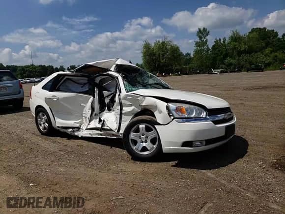 2004 Chevrolet Malibu Maxx LT z VIN 1G1ZU648X4F154614, wystawiony jako Copart lot #63988845 z przebiegiem 66 308 mil mil oraz Szkoda całkowita • Salvage title. Historia ofert i sprzedaży dostępna na DreamBid. Obrazek 13.