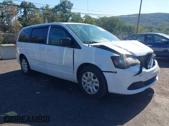 2014 Dodge Grand Caravan SE with VIN 2C4RDGBG0ER379853, listed as a IAAI auction lot 43251278 with 149,299 mi miles and . Bid and sale history available at DreamBid. Image 1.