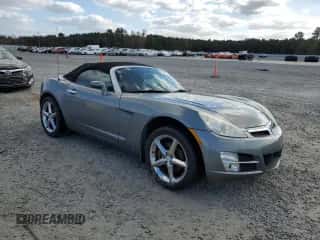 2007 Saturn Sky с VIN 1G8MB35B57Y125072, выставлен на аукционе Copart как лот 79277594 с пробегом 122 002 миль миль и Списание • Salvage title. История ставок и продаж доступна на DreamBid. Изображение 4.