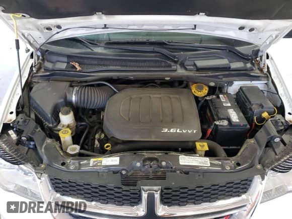 2016 Dodge Grand Caravan American Value z VIN 2C4RDGBG7GR184478, wystawiony jako Copart lot #58012835 z przebiegiem 166 296 mil mil oraz Szkoda całkowita • Salvage title. Historia ofert i sprzedaży dostępna na DreamBid. Obrazek 12.