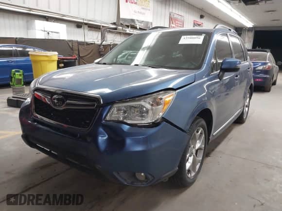 2015 Subaru Forester Touring with VIN JF2SJAUC9FH807385, listed as a IAAI auction lot 43508096 with 103,862 mi miles and . Bid and sale history available at DreamBid. Image 2.