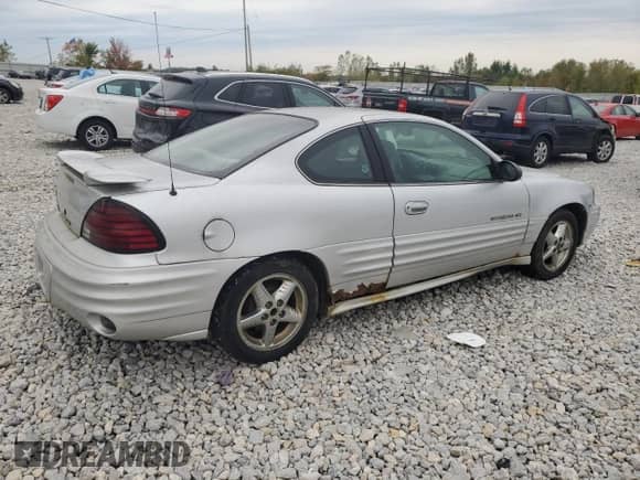 2002 Pontiac Grand Am с VIN 1G2NF12E32C202940, выставлен на аукционе Copart как лот 73576474 с пробегом 118 816 миль миль и Чистый • Clean title. История ставок и продаж доступна на DreamBid. Изображение 3.
