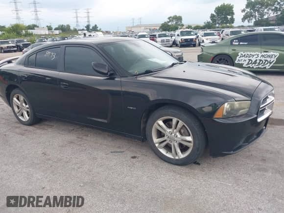 2011 Dodge Charger RT Max with VIN 2B3CM5CT2BH552748, listed as a IAAI auction lot 43028493 with 196,995 mi miles and . Bid and sale history available at DreamBid. Image 1.