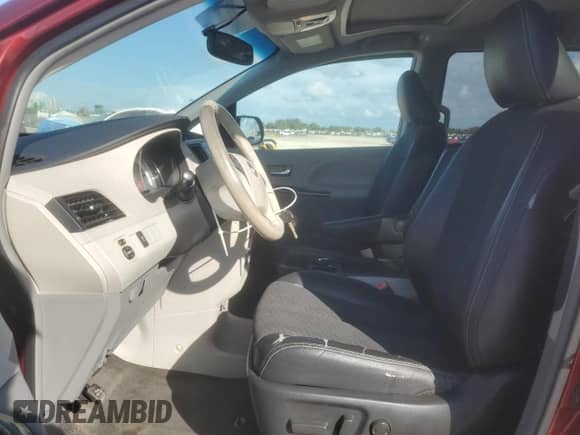 2014 Toyota Sienna SE with VIN 5TDXK3DC5ES442131, listed as a Copart auction lot 87235315 with 98,342 mi miles and Clean title. Bid and sale history available at DreamBid. Image 7.