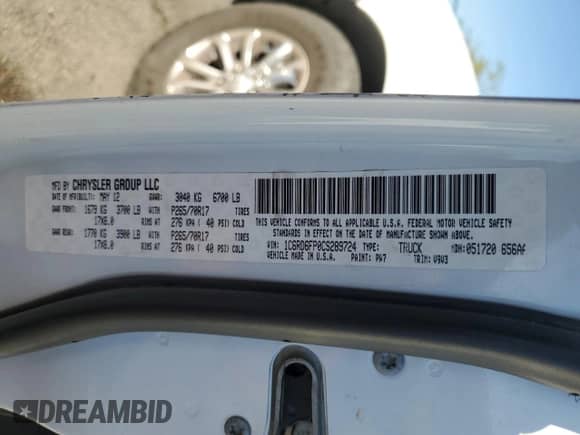 2012 Ram 1500 Tradesman z VIN 1C6RD6FP0CS289724, wystawiony jako Copart lot #66648955 z przebiegiem 205 151 mil mil oraz Szkoda całkowita • Salvage title. Historia ofert i sprzedaży dostępna na DreamBid. Obrazek 12.