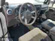 2010 Jeep Wrangler Sahara с VIN 1J4AA5D15AL167384, выставлен на аукционе Copart как лот 64210485 с пробегом 138 320 миль миль и Чистый • Clean title. История ставок и продаж доступна на DreamBid. Изображение 8.