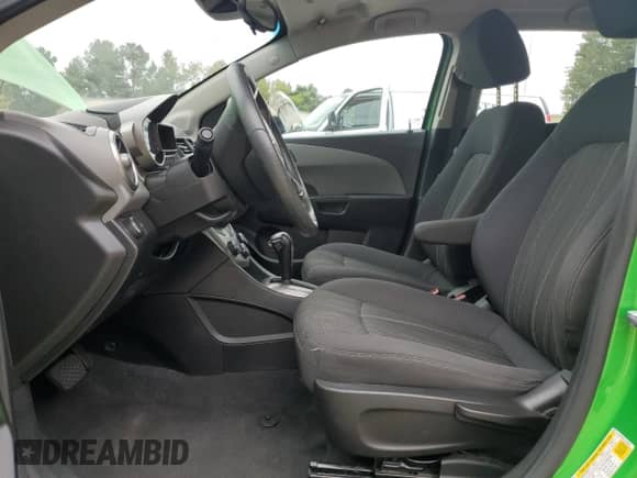 2016 Chevrolet Sonic LT with VIN 1G1JC6SH0G4116618, listed as a Copart auction lot 80083965 with 101,474 mi miles and Salvage title. Bid and sale history available at DreamBid. Image 7.