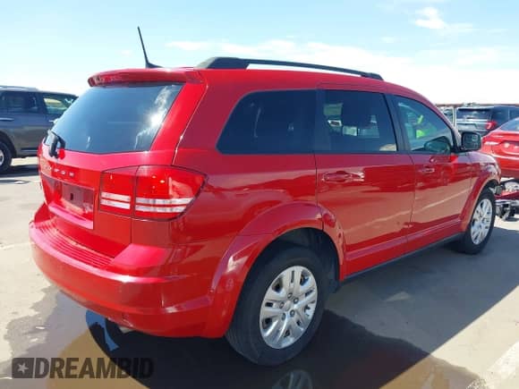 2020 Dodge Journey SE Value with VIN 3C4PDCAB0LT199658, listed as a IAAI auction lot 43165342 with 110,376 mi miles and . Bid and sale history available at DreamBid. Image 4.