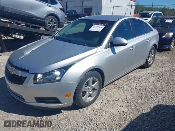 2012 Chevrolet Cruze 1LT with VIN 1G1PF5SC2C7145546, listed as a IAAI auction lot 43392651 with 63,636 mi miles and . Bid and sale history available at DreamBid. Image 2.