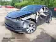 2023 Tesla Model Y Long Range z VIN 7SAYGAEE8PF880355, wystawiony jako IAAI lot #42635761 z przebiegiem 57 442 mil mil oraz . Historia ofert i sprzedaży dostępna na DreamBid. Obrazek 20.