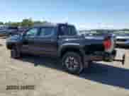 2016 Toyota Tacoma TRD Sport with VIN 3TMCZ5AN1GM007573, listed as a Copart auction lot 71623385 with 131,046 mi miles and Salvage title. Bid and sale history available at DreamBid. Image 2.