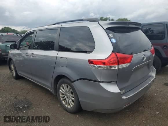 2012 Toyota Sienna XLE AAS with VIN 5TDYK3DC1CS273369, listed as a Copart auction lot 62348025 with Not provided miles and Clean title. Bid and sale history available at DreamBid. Image 2.