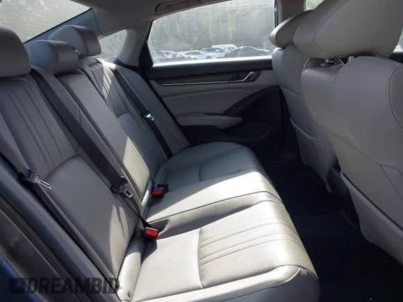 2020 Honda Accord Touring with VIN 1HGCV3F90LA013434, listed as a IAAI auction lot 42075502 with 56,645 mi miles and . Bid and sale history available at DreamBid. Image 8.
