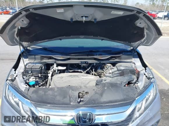 2019 Honda Odyssey EX-L with VIN 5FNRL6H73KB073550, listed as a IAAI auction lot 41666490 with 40,518 mi miles and . Bid and sale history available at DreamBid. Image 10.