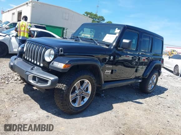 2022 Jeep Wrangler Unlimited Sahara Altitude с VIN 1C4HJXEG3NW118353, выставлен на аукционе IAAI как лот 42710775 с пробегом 59 318 миль миль и . История ставок и продаж доступна на DreamBid. Изображение 17.