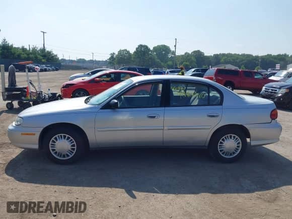 2005 Chevrolet Malibu Classic z VIN 1G1ND52F05M157948, wystawiony jako IAAI lot #42802810 z przebiegiem 61 473 mil mil oraz . Historia ofert i sprzedaży dostępna na DreamBid. Obrazek 14.