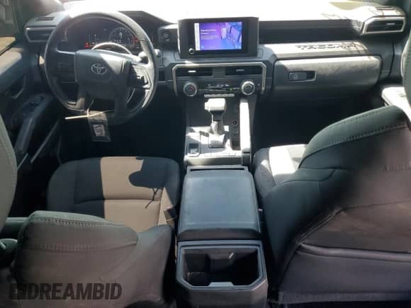 2024 Toyota Tacoma SR with VIN 3TYKD5HNXRT000886, listed as a Copart auction lot 66936505 with 21,648 mi miles and Salvage title. Bid and sale history available at DreamBid. Image 8.