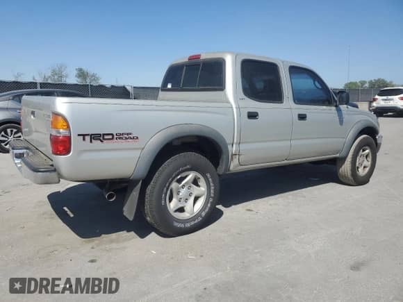 2002 Toyota Tacoma PreRunner z VIN 5TEGM92N82Z052575, wystawiony jako Copart lot #50062815 z przebiegiem 314 154 mil mil oraz Czysty tytuł • Clean title. Historia ofert i sprzedaży dostępna na DreamBid. Obrazek 3.