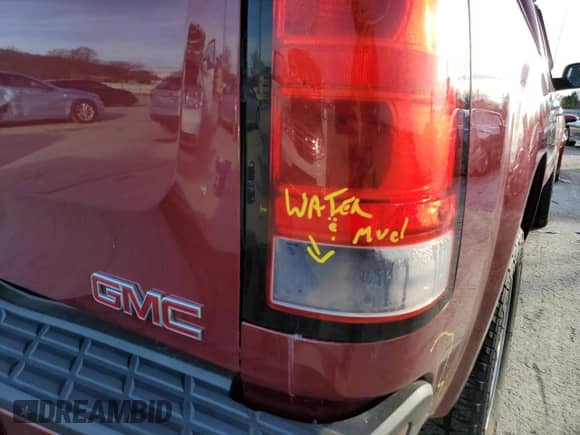 2013 GMC Sierra 1500 Denali with VIN 3GTP1XE26DG291720, listed as a Copart auction lot 86026014 with 163,952 mi miles and Salvage title. Bid and sale history available at DreamBid. Image 12.