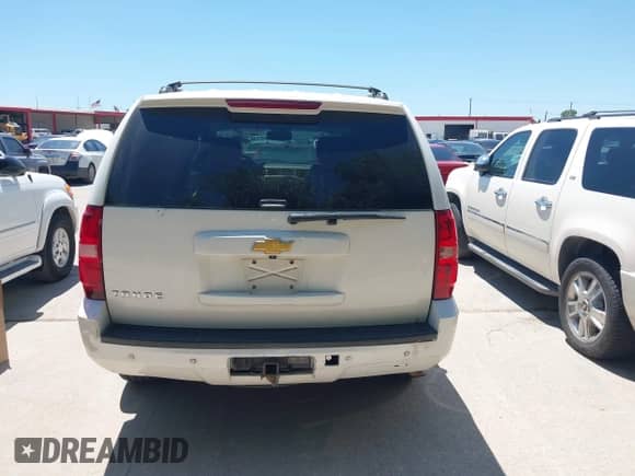 2014 Chevrolet Tahoe LT with VIN 1GNSCBE03ER213054, listed as a IAAI auction lot 42821489 with 166,689 mi miles and . Bid and sale history available at DreamBid. Image 16.