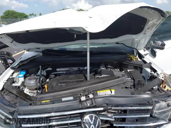 2022 Volkswagen Tiguan SE with VIN 3VV3B7AX1NM042582, listed as a IAAI auction lot 43073057 with 28,724 mi miles and . Bid and sale history available at DreamBid. Image 10.