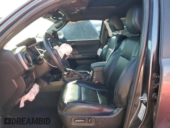 2021 Toyota Tacoma TRD Off Road with VIN 3TMCZ5AN4MM424715, listed as a Copart auction lot 86407685 with 55,946 mi miles and Salvage title. Bid and sale history available at DreamBid. Image 7.