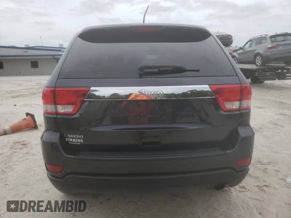 2012 Jeep Grand Cherokee Laredo z VIN 1C4RJEAG8CC229445, wystawiony jako Copart lot #82411545 z przebiegiem 111 210 mil mil oraz Szkoda całkowita • Salvage title. Historia ofert i sprzedaży dostępna na DreamBid. Obrazek 6.