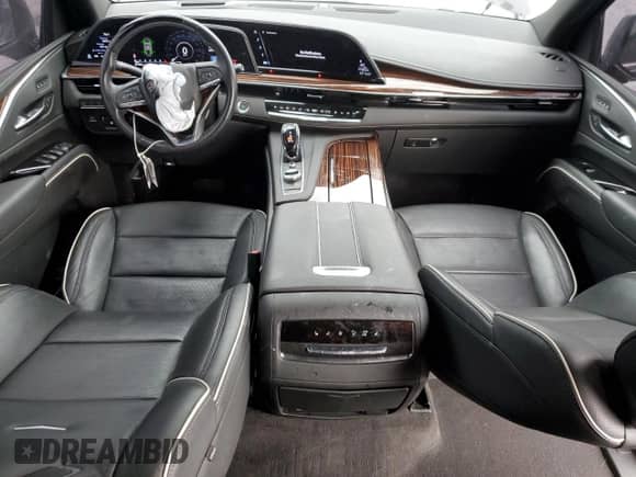 2022 Cadillac Escalade Premium Luxury с VIN 1GYS4CKL6NR180040, выставлен на аукционе Copart как лот 42239625 с пробегом 29 100 миль миль и Списание • Salvage title. История ставок и продаж доступна на DreamBid. Изображение 8.