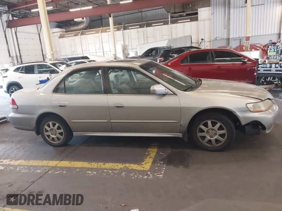 2002 Honda Accord SE с VIN JHMCG56752C026846, выставлен на аукционе IAAI как лот 43194900 с пробегом 244 770 миль миль и . История ставок и продаж доступна на DreamBid. Изображение 13.