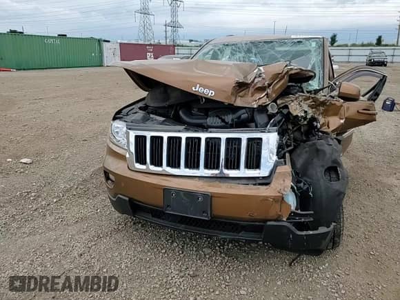 2011 Jeep Grand Cherokee 70th Anniversary with VIN 1J4RR4GG6BC646162, listed as a Copart auction lot 64792705 with Not provided miles and Salvage title. Bid and sale history available at DreamBid. Image 12.
