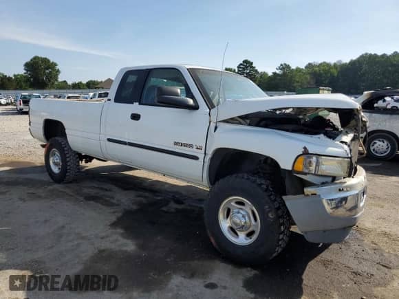 2001 Dodge 2500 with VIN 1B7KF23W01J512727, listed as a Copart auction lot 63804254 with 148,220 mi miles and Salvage title. Bid and sale history available at DreamBid. Image 4.