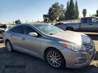 2013 Hyundai Azera z VIN KMHFH4JG3DA214336, wystawiony jako Copart lot #81593544 z przebiegiem 117 298 mil mil oraz Czysty tytuł • Clean title. Historia ofert i sprzedaży dostępna na DreamBid. Obrazek 4.