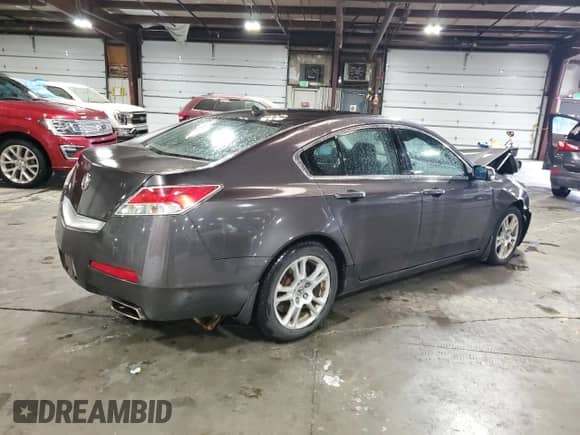 2009 Acura TL с VIN 19UUA86299A005518, выставлен на аукционе Copart как лот 82152565 с пробегом 115 120 миль миль и Списание • Salvage title. История ставок и продаж доступна на DreamBid. Изображение 3.