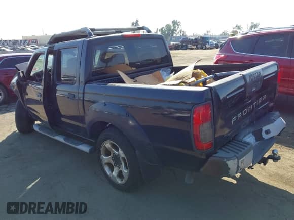 2001 Nissan Frontier with VIN 1N6MD27T41C389353, listed as a IAAI auction lot 37914035 with 89,895 mi miles and . Bid and sale history available at DreamBid. Image 3.
