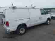 2009 Ford Econoline Cargo Commercial with VIN 1FTNE24W19DA72591, listed as a IAAI auction lot 42613439 with 239,038 mi miles and . Bid and sale history available at DreamBid. Image 4.