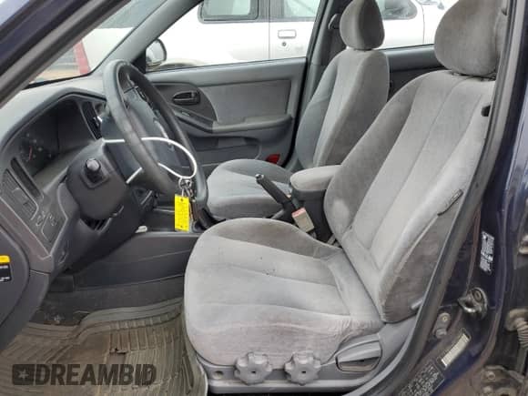 2005 Hyundai Elantra GLS z VIN KMHDN46D85U186001, wystawiony jako Copart lot #73660224 z przebiegiem 261 622 mil mil oraz Szkoda całkowita • Salvage title. Historia ofert i sprzedaży dostępna na DreamBid. Obrazek 7.