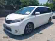 2012 Toyota Sienna SE with VIN 5TDXK3DC1CS186020, listed as a IAAI auction lot 42471455 with 215,048 mi miles and . Bid and sale history available at DreamBid. Image 2.