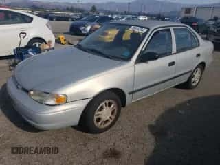 2001 Chevrolet Prizm z VIN 1Y1SK52811Z447352, wystawiony jako Copart lot #73916394 z przebiegiem 89 265 mil mil oraz Szkoda całkowita • Salvage title. Historia ofert i sprzedaży dostępna na DreamBid. Obrazek 1.