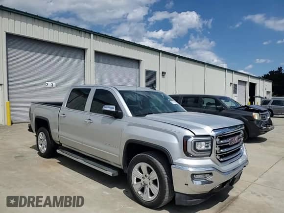2018 GMC Sierra 1500 SLT z VIN 3GTP1NEC2JG115045, wystawiony jako Copart lot #68701185 z przebiegiem 63 938 mil mil oraz Szkoda całkowita • Salvage title. Historia ofert i sprzedaży dostępna na DreamBid. Obrazek 13.